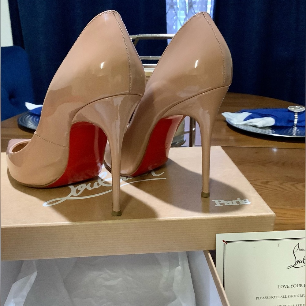 Christian Louboutin Nude 6248 Red Bottoms.